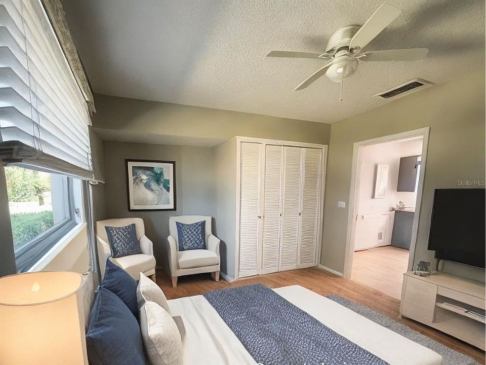 Digitally enhanced with virtual staging to illustrate potential use of the space. The furniture and decor shown do not reflect the actual contents of the property. Prospective buyers are encouraged to visit the property in person to see its true potential and features.