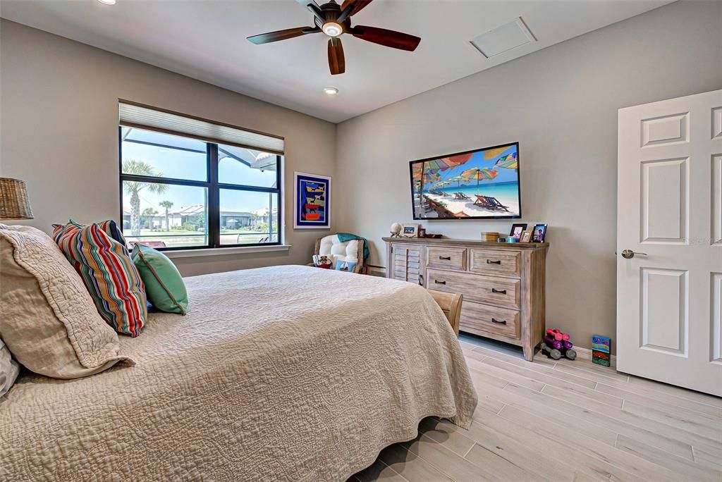 Owner's bedroom is bright and fresh.