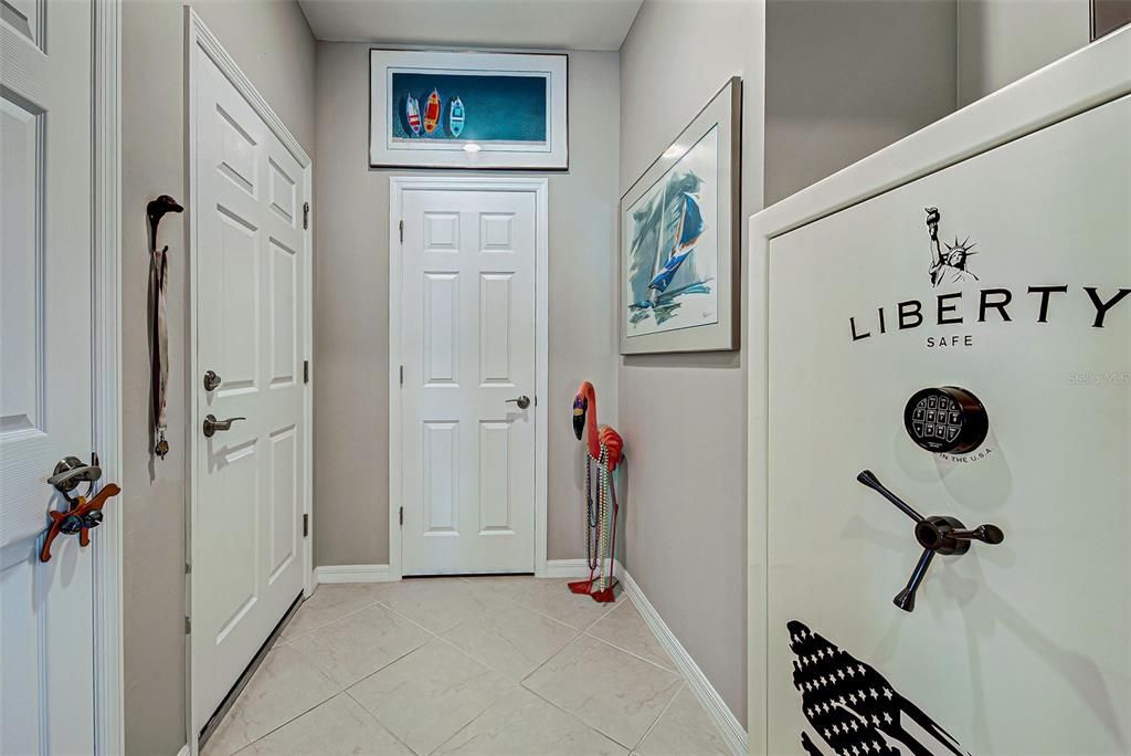 Garage entrance, coat closet and walkway.