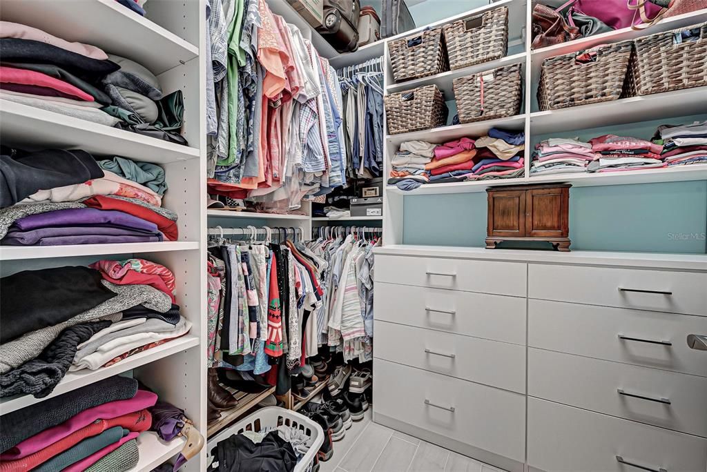 Custom design Owners closet with maximum storage space.