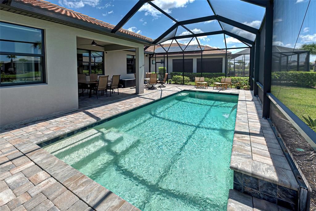 Pool with steps and waterfall ledge