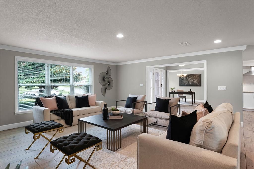 Formal living room with large windows