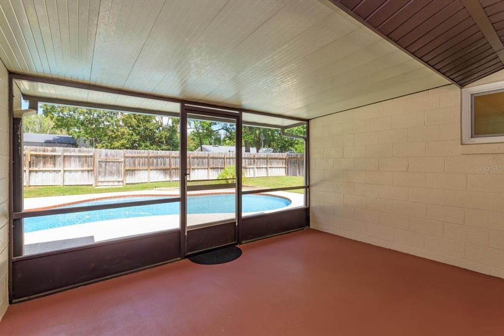 Back screened in porch off the family/flex room