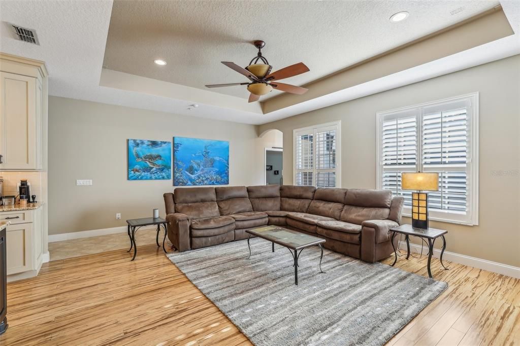 The must see PRIMARY SUITE is a tranquil retreat for the homeowner with a lovely tray ceiling, direct access to the lanai, WALK-IN CLOSET and private en-suite bath.