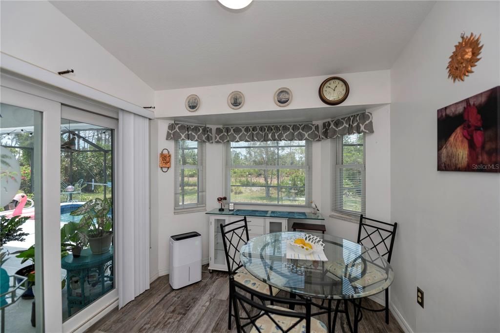 Breakfast nook overlooking the pool and nature preserve