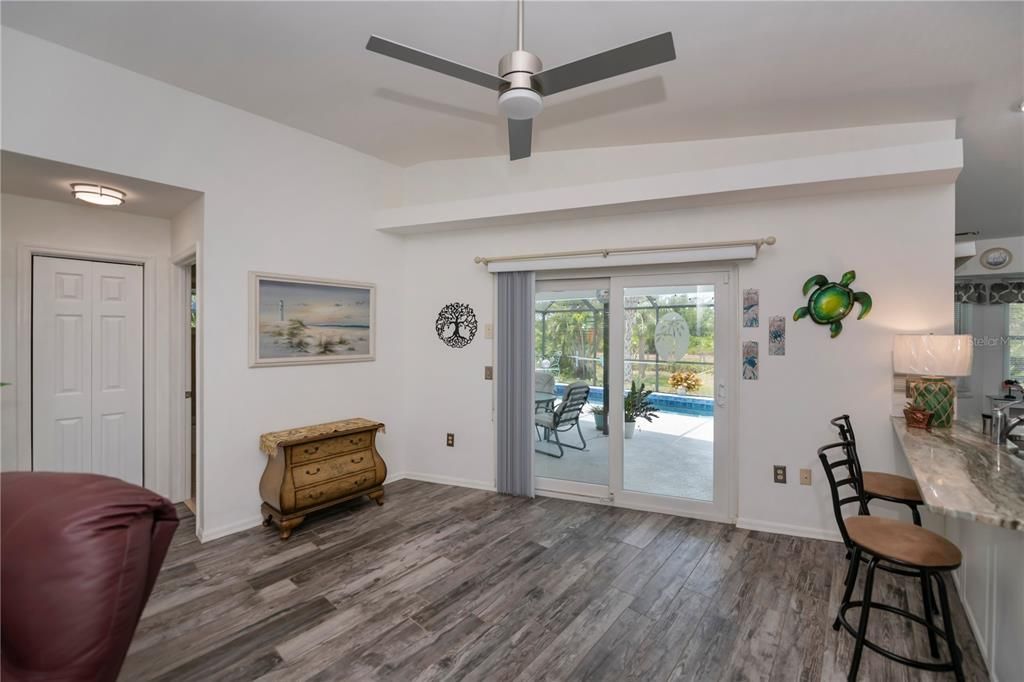 Formal dining room with slider to the pool