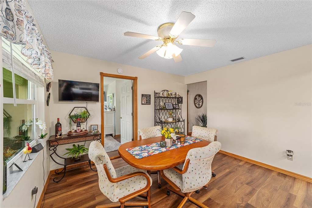 View from kitchen table toward primary bedroom