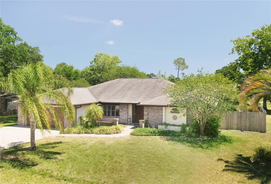 Sturdy Concrete Home with Brick and Stucco