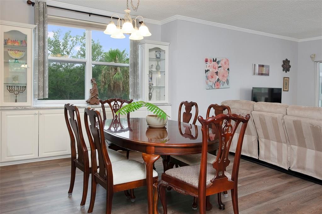 Dining room, Natural light plus a buffet area with storage!