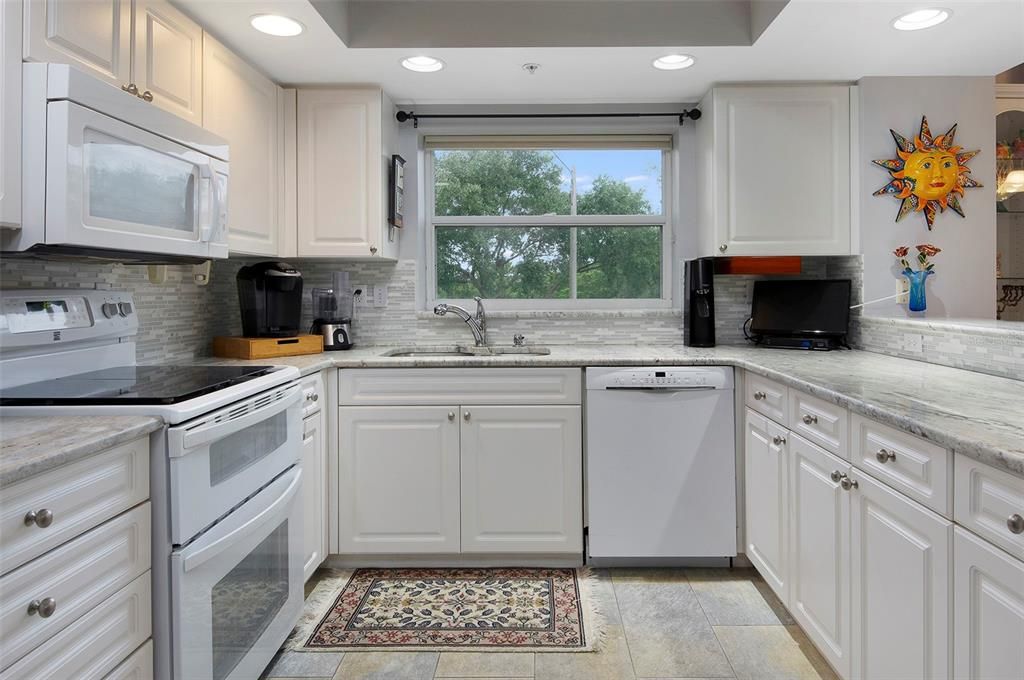 View to the kitchen. This home is open and flowing!