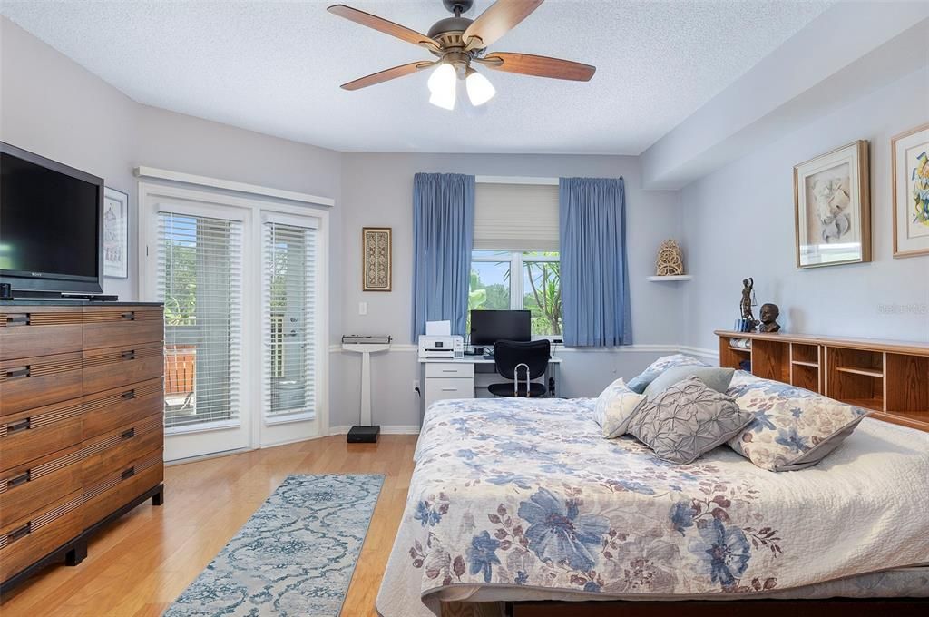 Large Primary Suite, opens to the Florida room and lots of natural light.