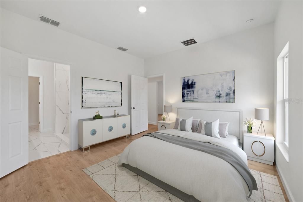 Ideal split bedrooms deliver a spacious primary bedroom featuring a private en-suite bath with an extended dual sink vanity for ample storage and a WALK-IN SHOWER with beautiful custom tile work! Virtually Staged.