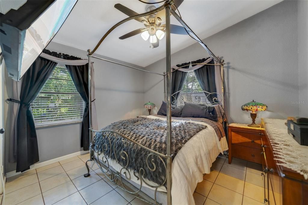 The spacious bedrooms share an updated full bath with the PRIMARY BEDROOM delivering a VAULTED CEILING and WALK-IN CLOSET.