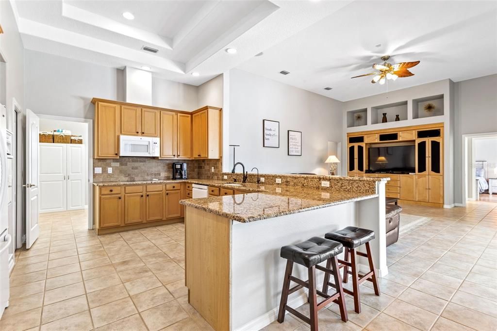 Kitchen with view to laundry room and garage access