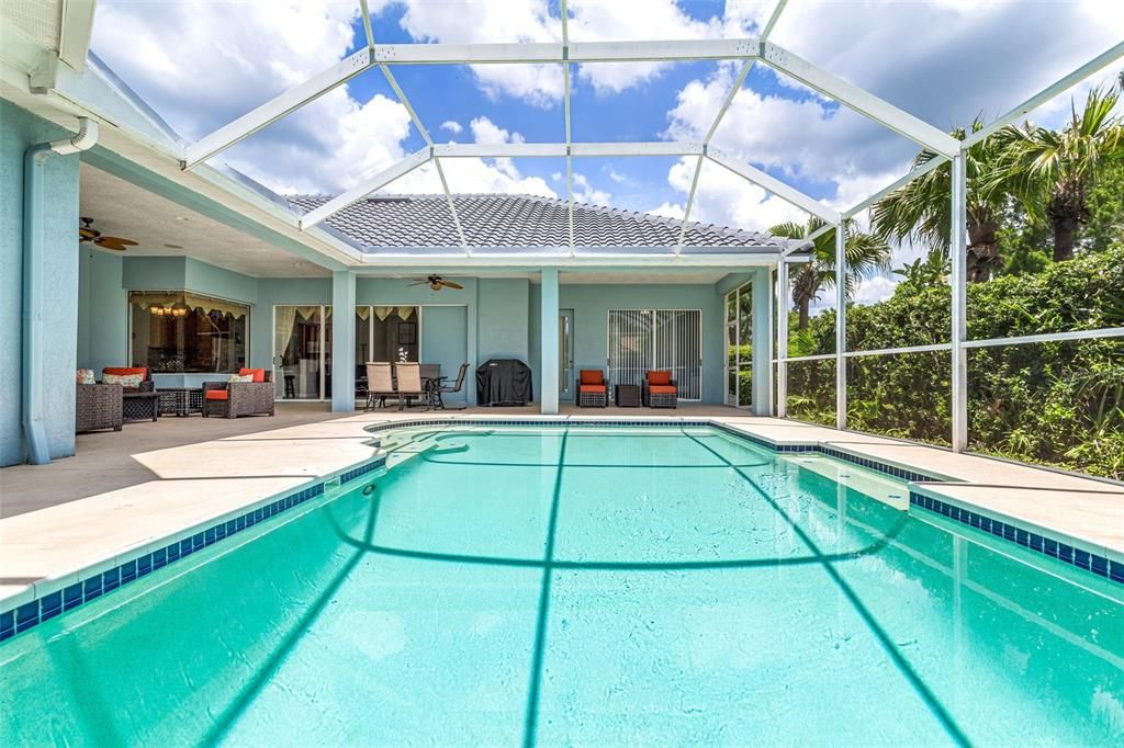 Pool lanai with room for dining and lounging