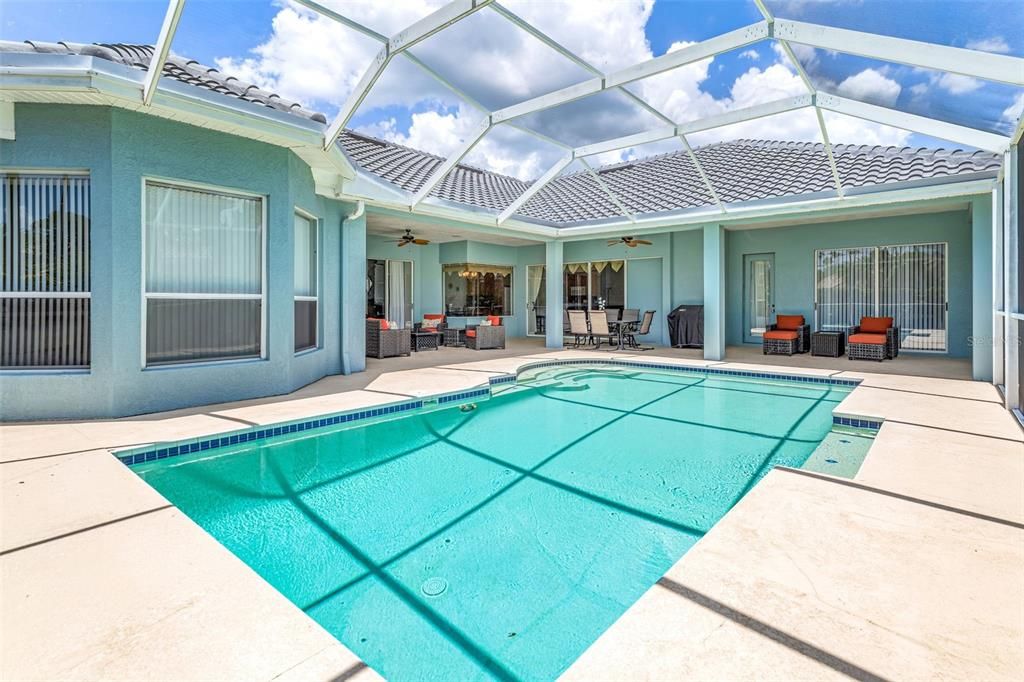 Pool lanai with room for dining and lounging