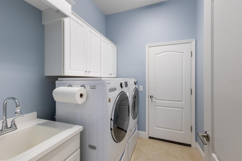 Laundry room is located off the garage leading to the kitchen