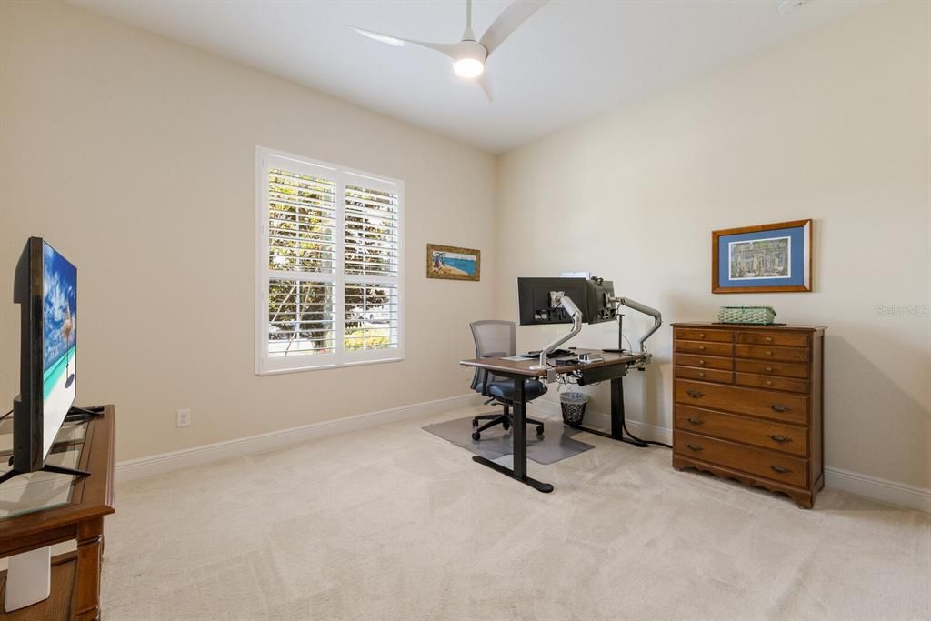 Front third bedroom being utilized as a home office
