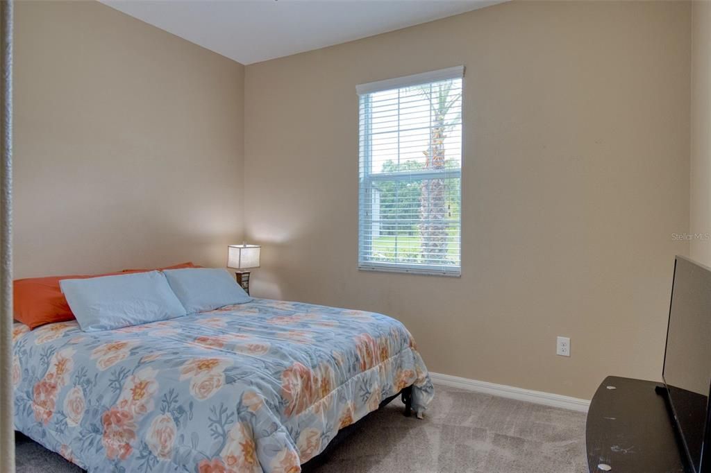 Bedroom 2  is a private and cozy space. Great for in-laws with a full size bathroom only a few steps away. .