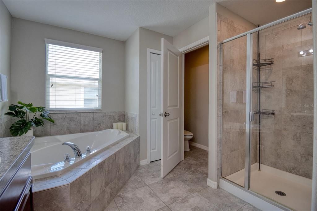 Soaking tub provides an oasis of relaxation in your own home.