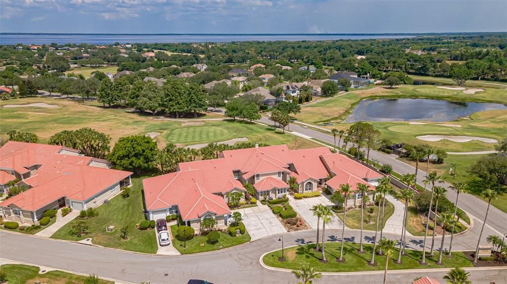 Aerial view of the front of the villa with the golf course East Lake Toho in the background