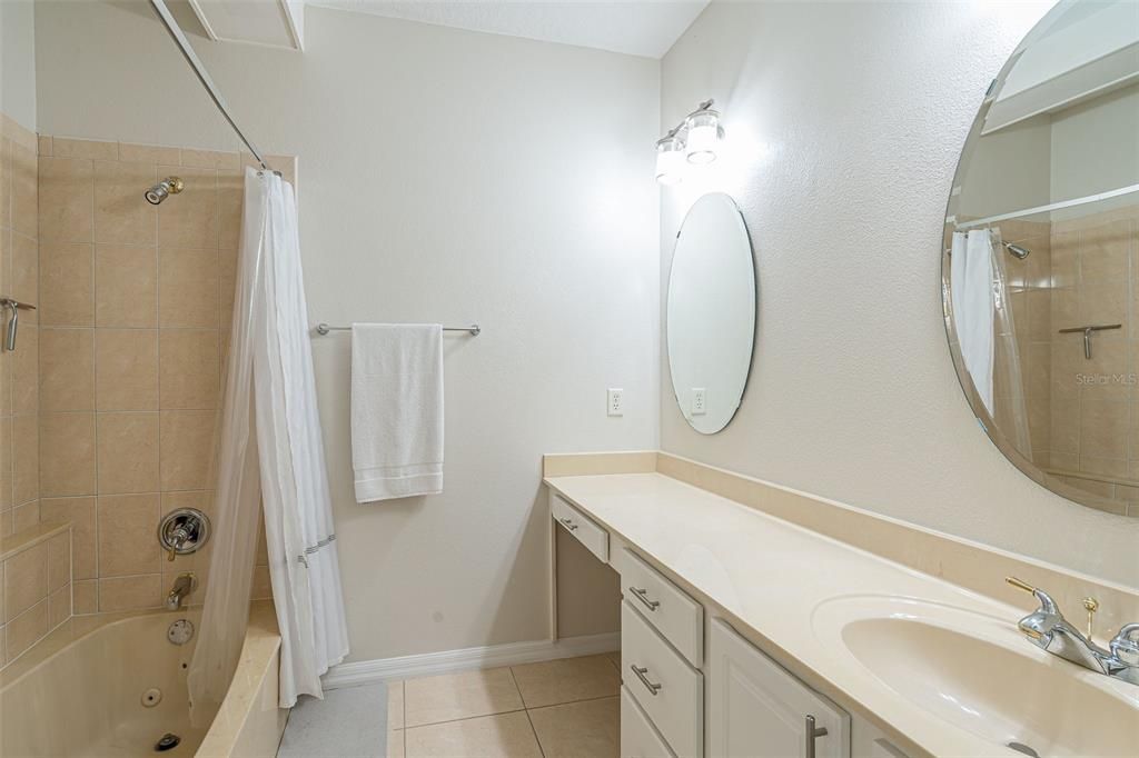 Upstairs - Full Bathroom with shower and tub