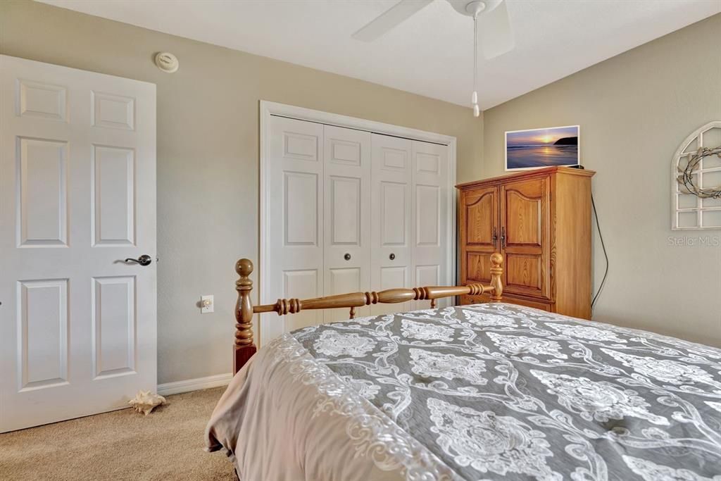 two closets in guest bedroom