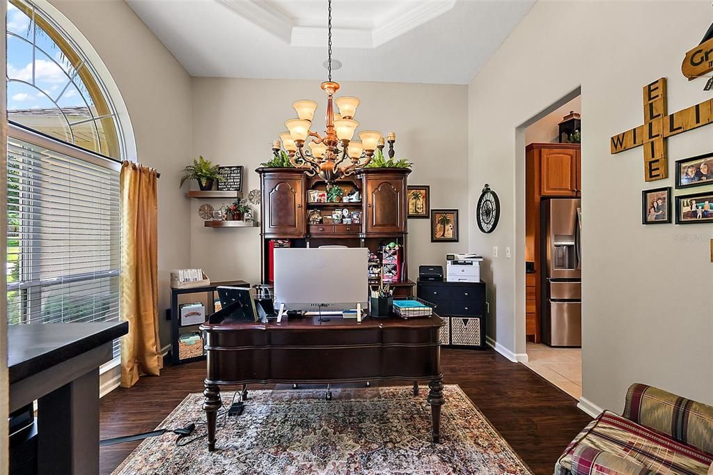 Formal dining is the Mrs. office with tray ceiling and lots of natural light