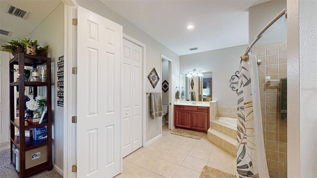 En-suite has two walk in closets, separate vanities and private water closet