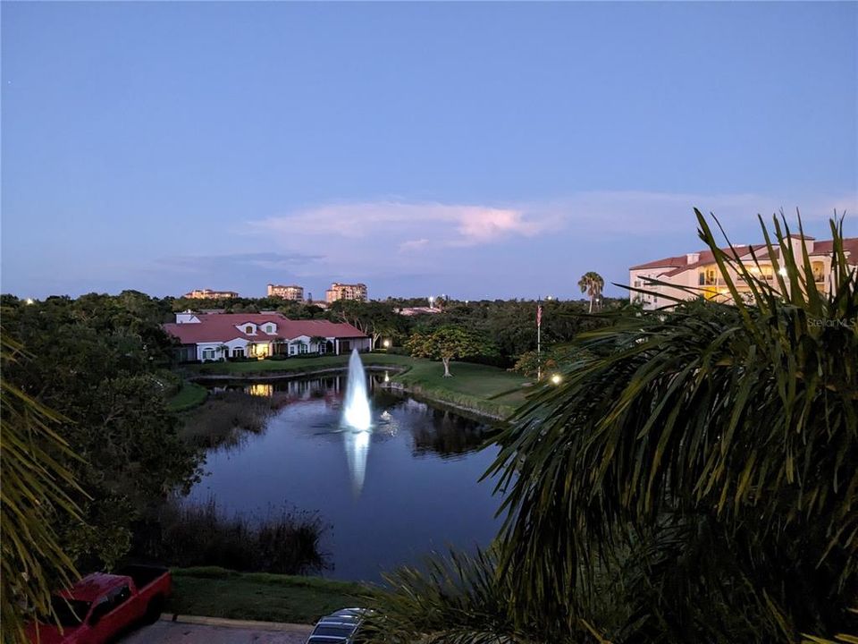 View from 3rd floor at dusk facing east overlooking pond