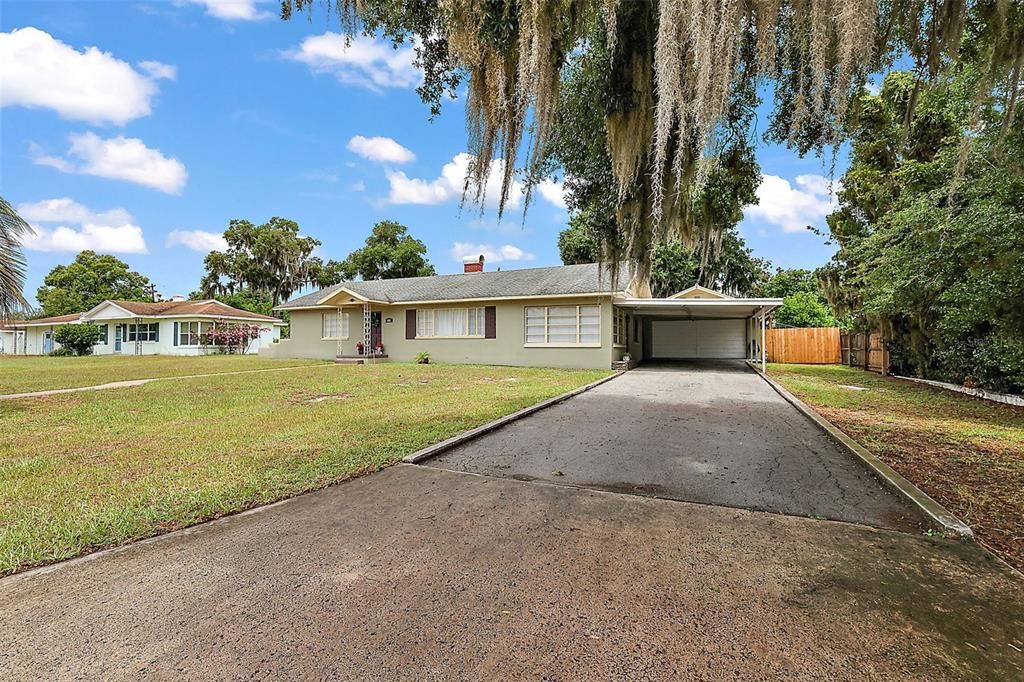 Incredible driveway leads to the carport and 2 car garage