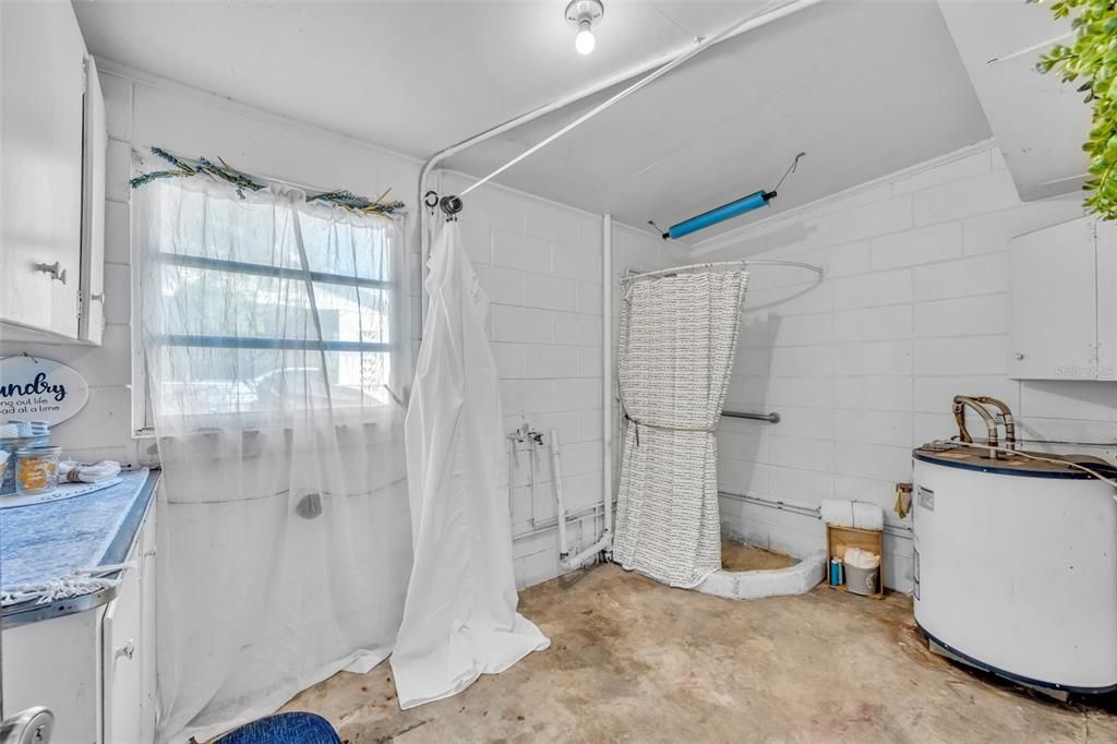 Shower in attached utility room