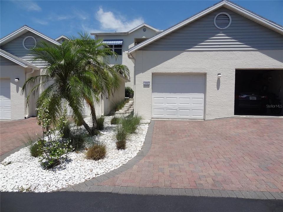 Your garage and walkway to your condo.