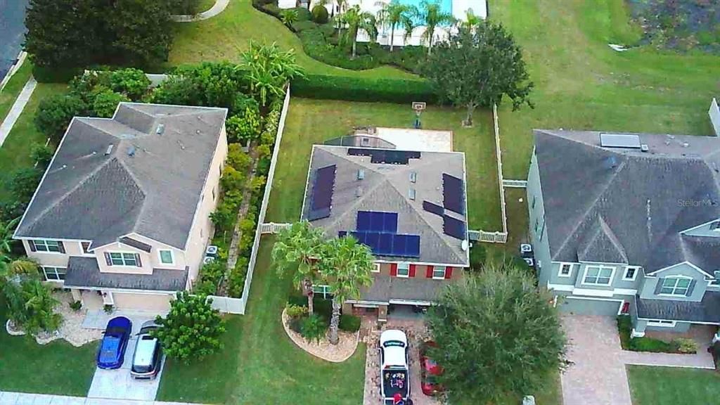 Drone shot of Home and Outdoor Entertainment Space Connecting to Common Community Amenities.