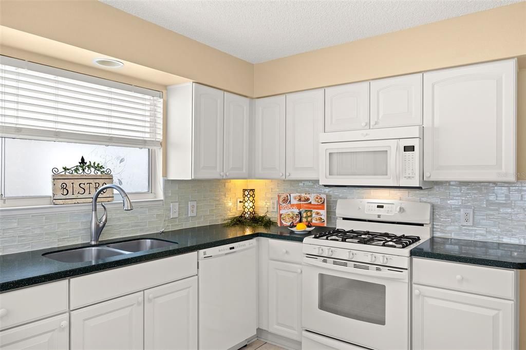 Natural light flows through the window above the sink.