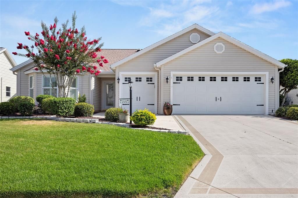 BOND PAID on this beautiful and meticulously maintained 3-bedroom, 2-bathroom Cypress Designer home with a golf cart garage, located in the desirable Village of Calumet Grove.