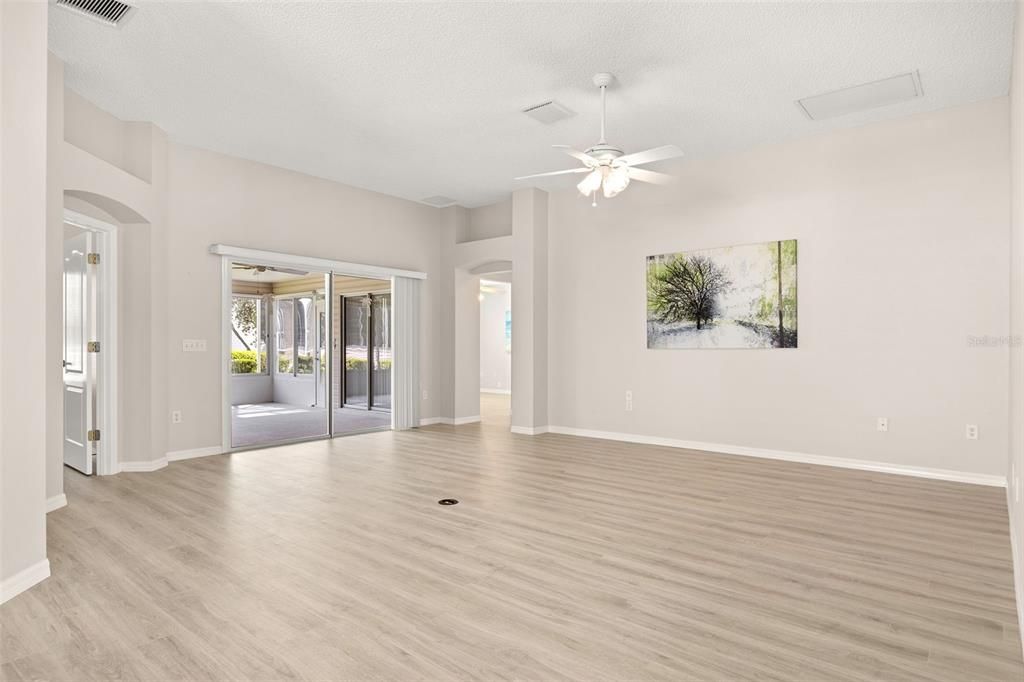 The spacious living room with solar tube for added natural light is the perfect place to relax.