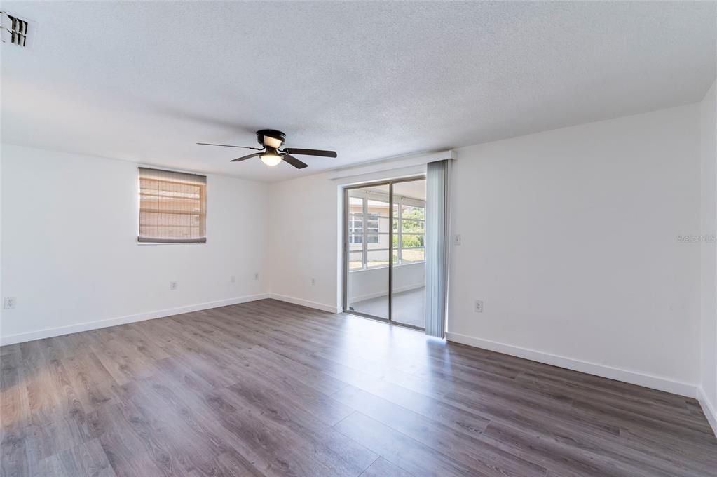 Primary bedroom-opens to porch area.