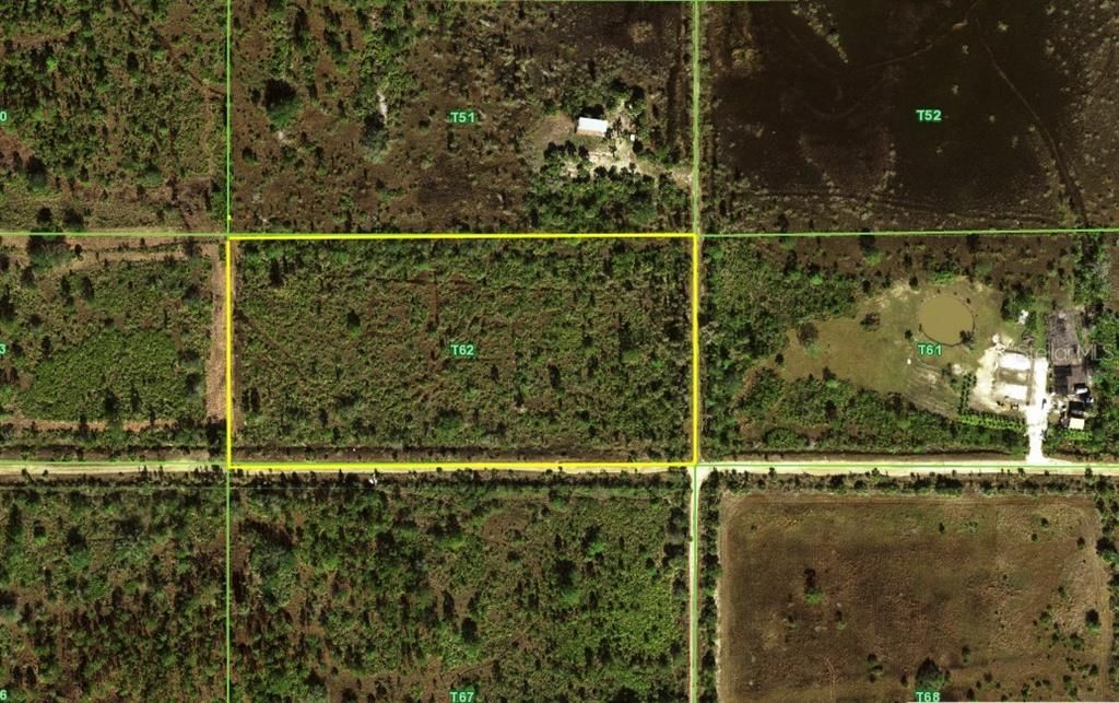 SW corner of property has two street intersection.  Two roadfronts.  1/2 mile off paved SR74.  Good road to property.