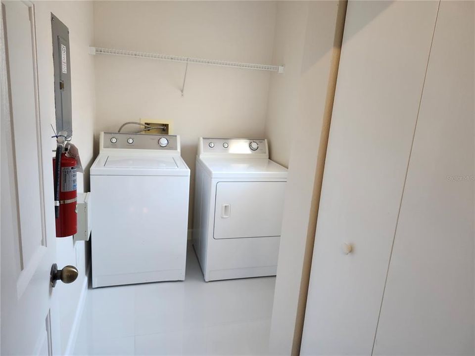 Inside Laundry room off the kitchen with full sized W&D