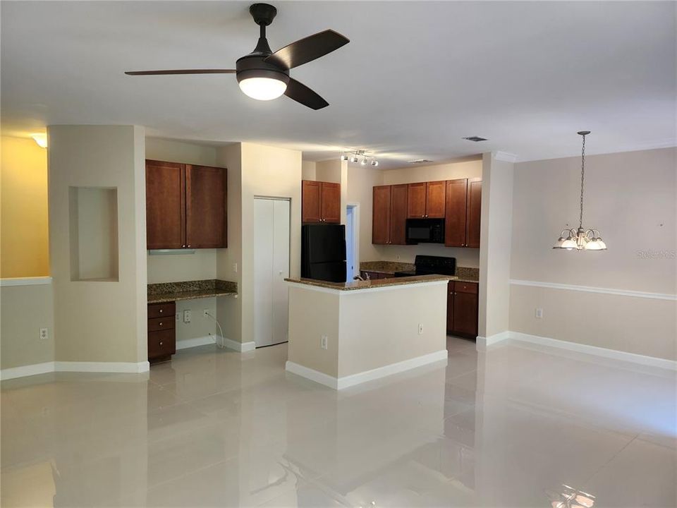 Kitchen with built in desk and island