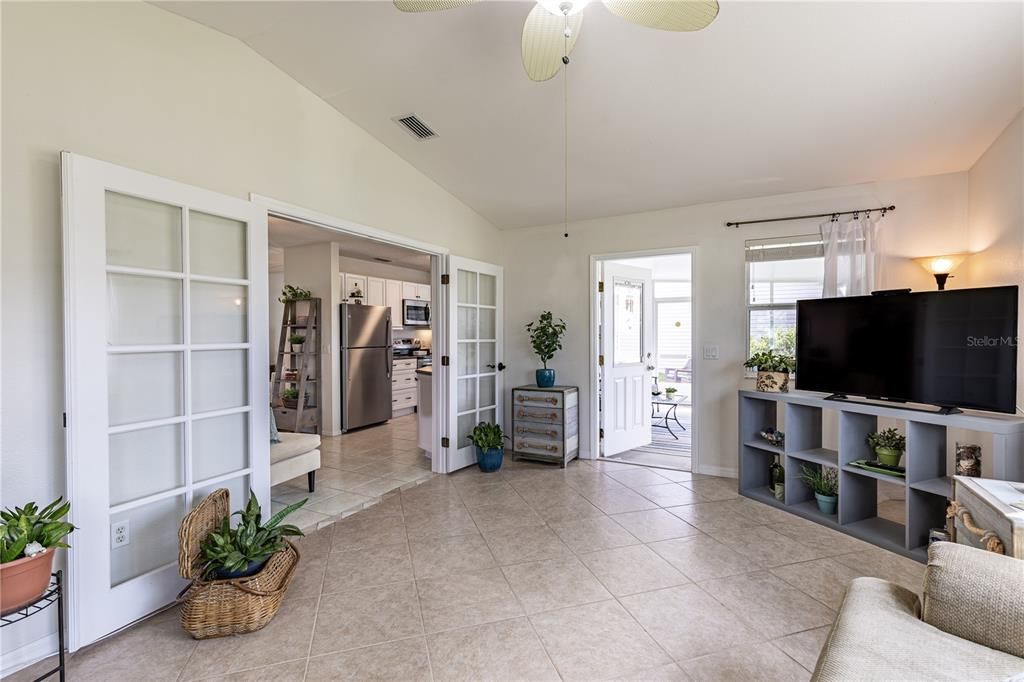 Great Room leading to Large Lanai. This room has an abundance of light! Great for an artist and their easel!