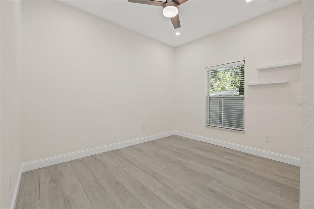 Bedroom 3 - remote ceiling fan / light combo.