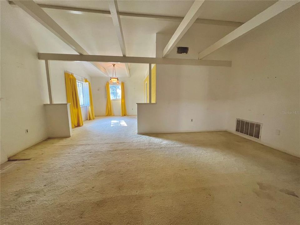 living room flows into dining room