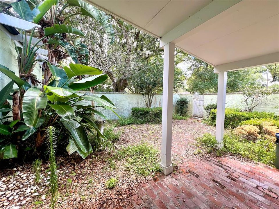 courtyard w/ small covered patio