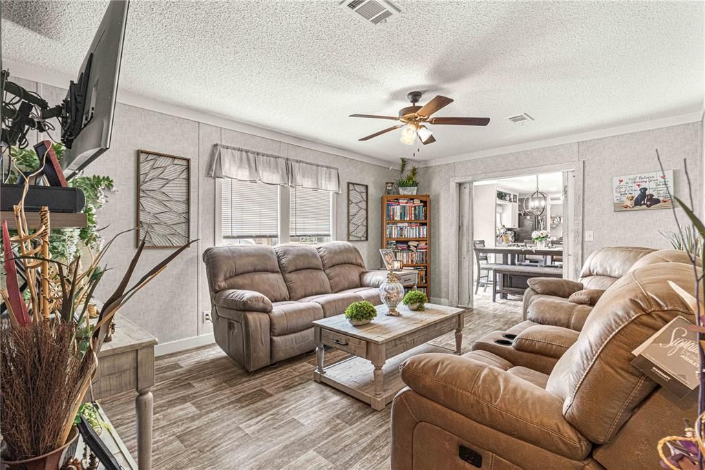 FAMILY ROOM WITH BARN DOORS TO DINING ROOM