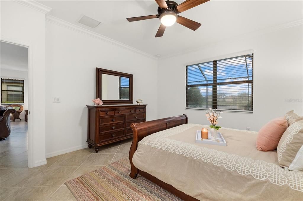 Primary Bedroom with Views of the Pool and Lake