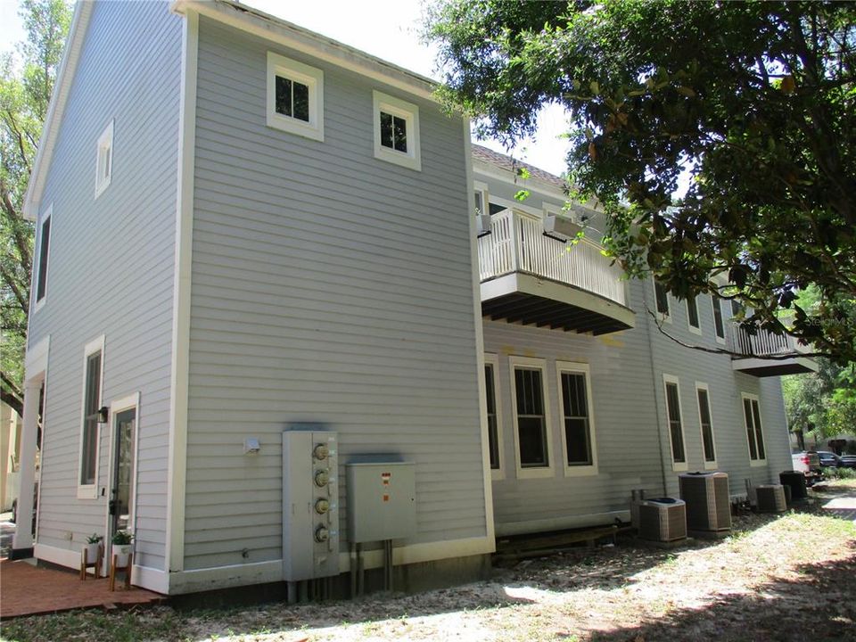 Rear of property with balcony