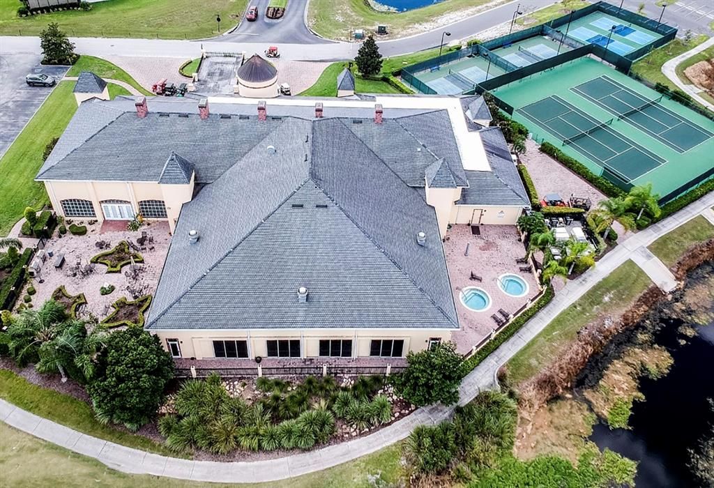 The rear of the Health and Fitness Center is dominated by the indoor pool. The rose garden is on the left and the spa patio is on the right. The tennis and pickleball courts are on the right.