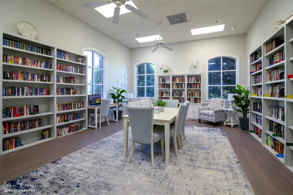 The main clubhouse media room is home to an honor system lending library and computer for resident use.